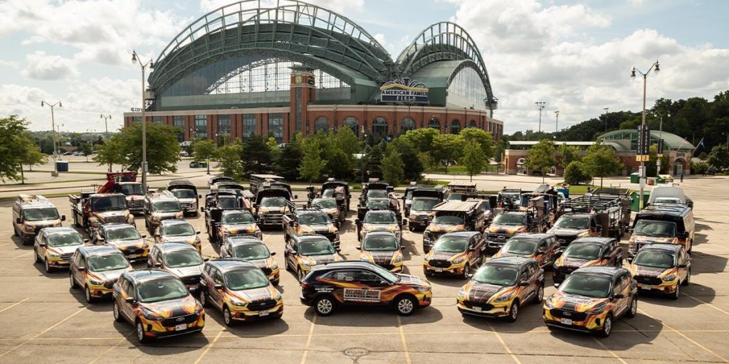 Fleet of cars parked outside American Family Field